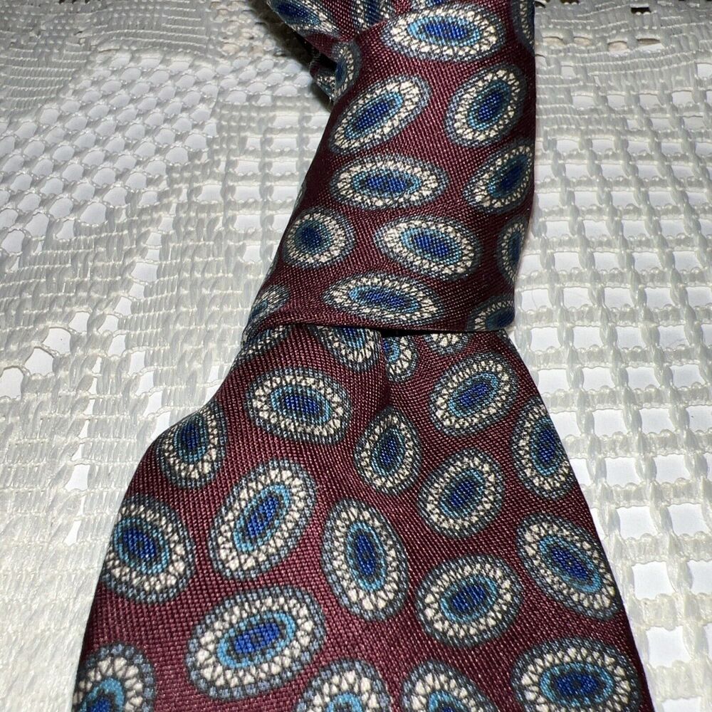 Robert Talbott Tie Cabernet Background With Small Paisley In Blue,green & cream